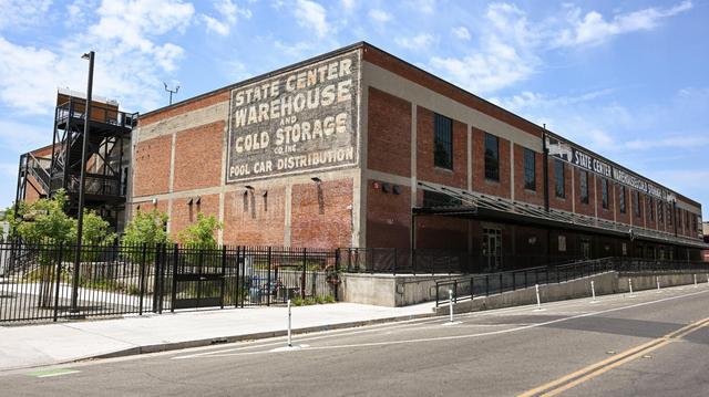 The State Center Warehouse building is located on R Street near Highway 41 in downtown Fresno.